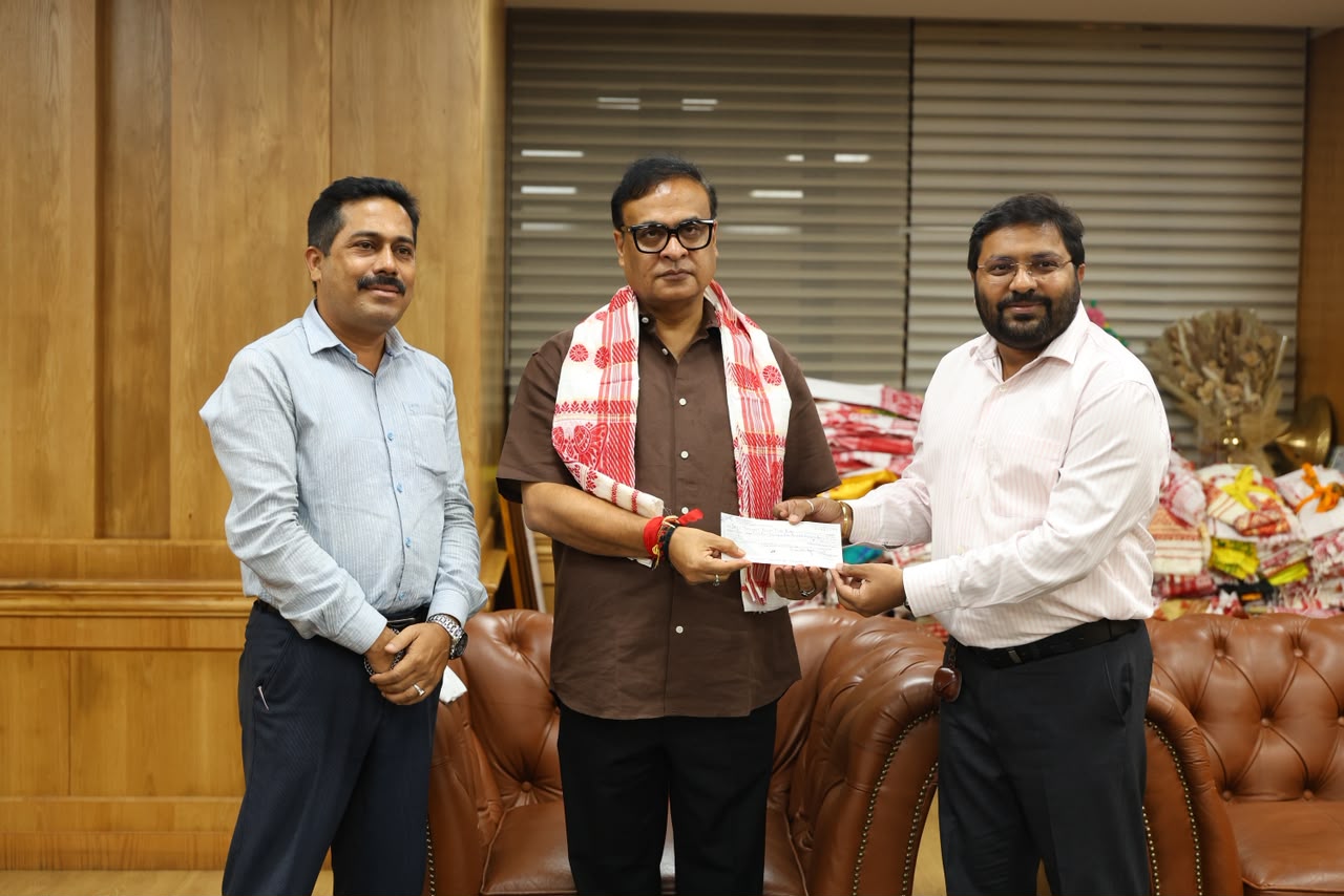 Managing Director Vishal Kumar Agarwal presenting a contribution to the Hon'ble Chief Minister of Assam